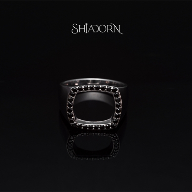 Cushion open spinel ring