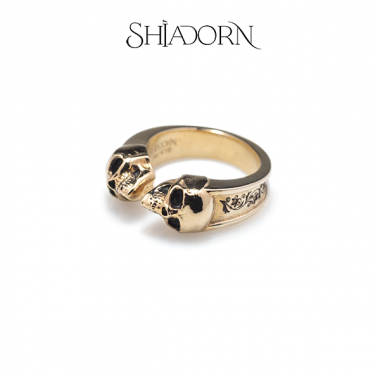 Twin skull 10k ring